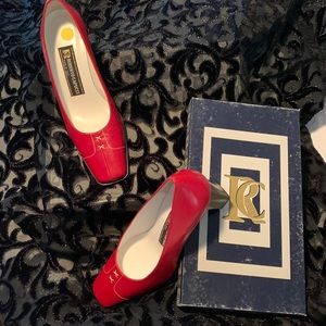 Beautifully sophisticated summer red pump 8 1/2. Never worn subtle white stitch